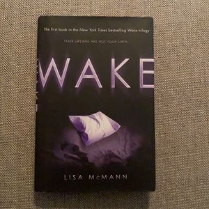 SIGNED, FIRST EDITION of WAKE by Lisa McMann